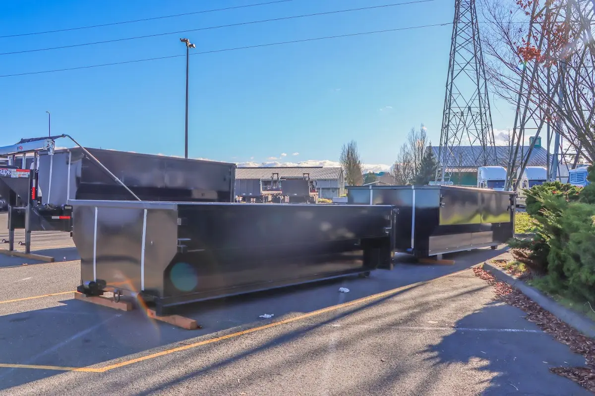 Roll-off dumpster ready for waste disposal at job site for Commercial Dumpster Rental in Verdigris